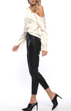 Line and dot faux leather leggings