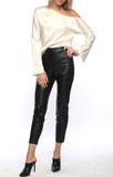 Line and dot faux leather leggings